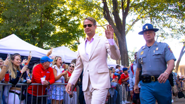 Lane Kiffin Quinshon Judkins Walk of Champions